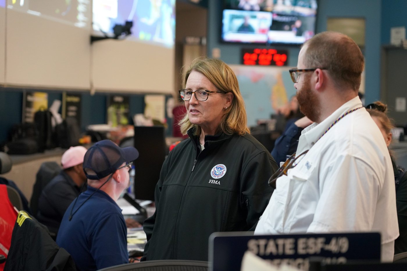 FEMA personnel coordinating with responders inside Florida’s emergency operations center during Hurricane Milton in 2024.
