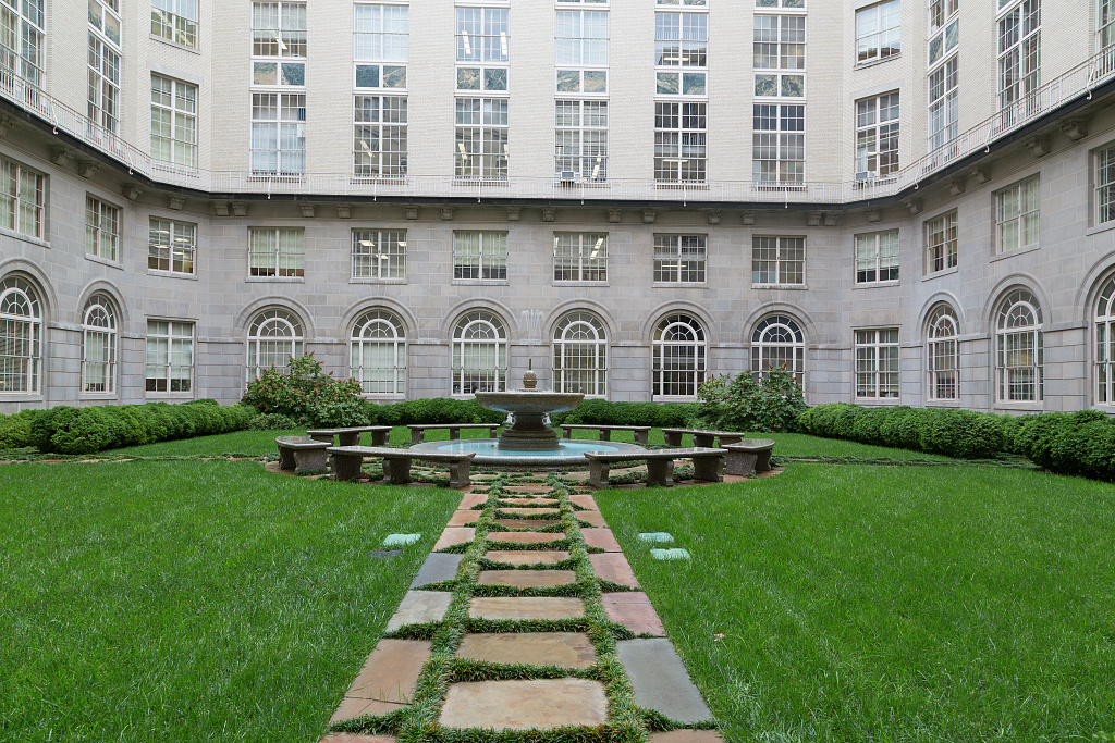 A landscaped courtyard and fountain at IRS headquarters in Washington, D.C.